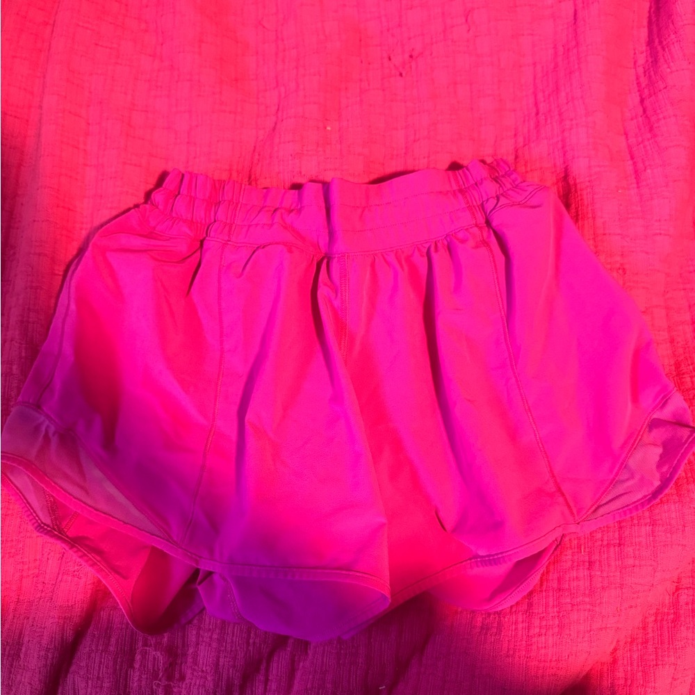 Size 10 pink lululemon shorts in perfect condition